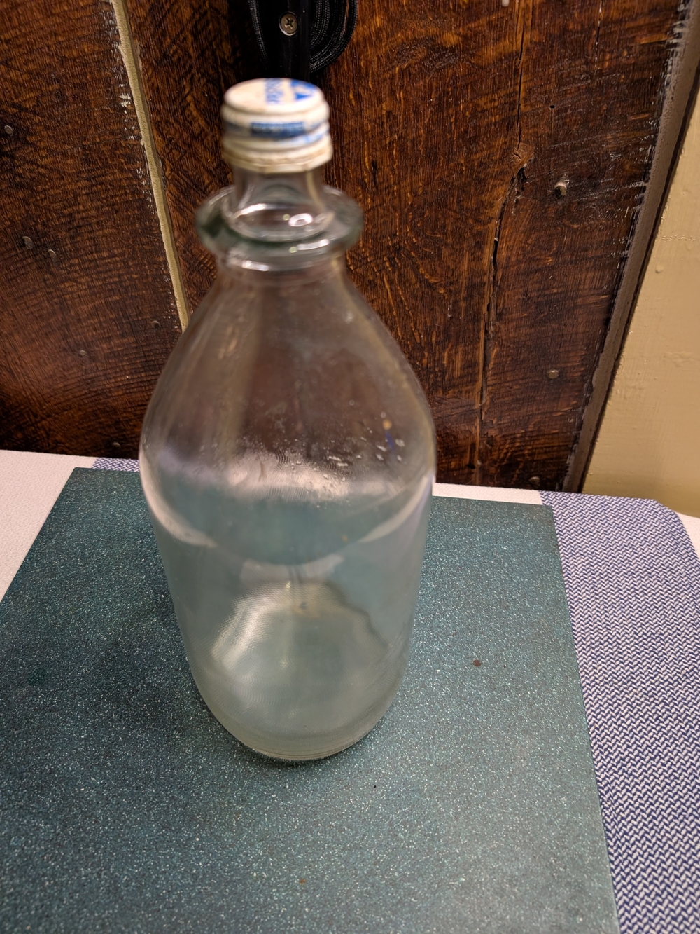 Multiple Antique Bottles In Varying Condition